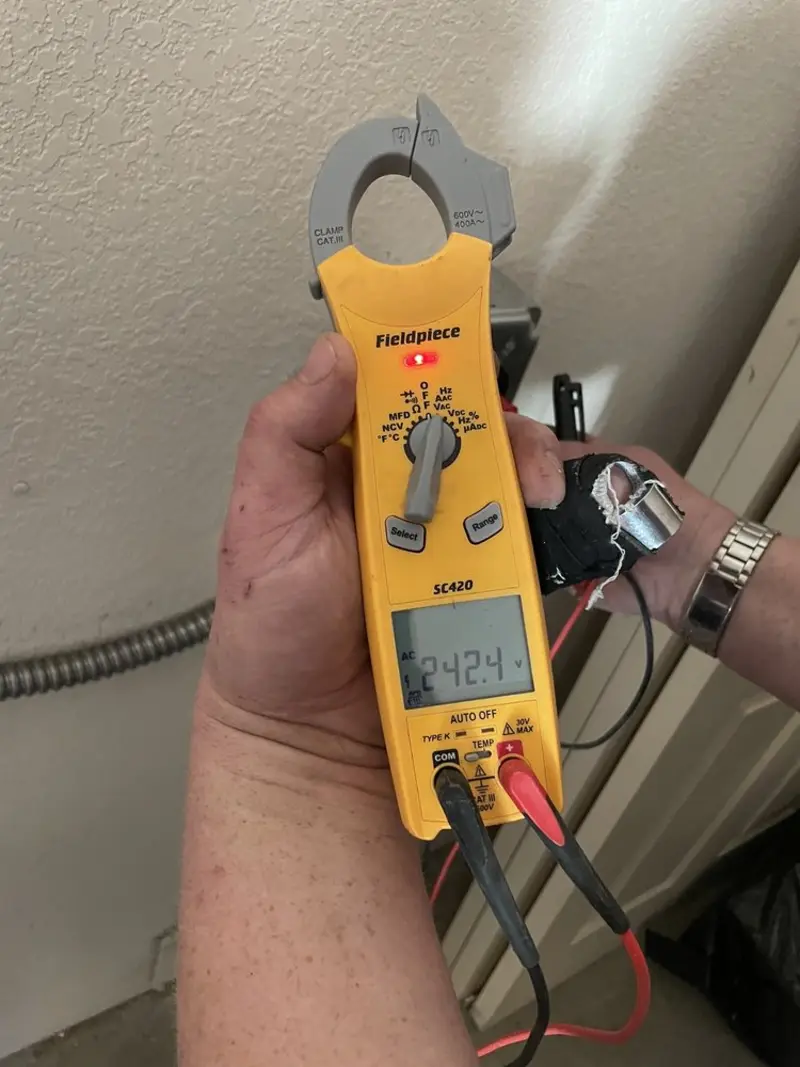 Voltage testing with clamp meter during Circuit Breaker Repair in Alexandria